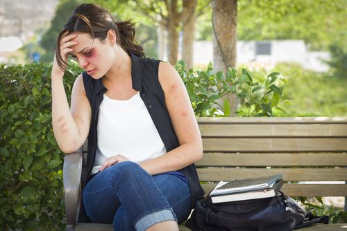 Young woman distraught from domestic violence